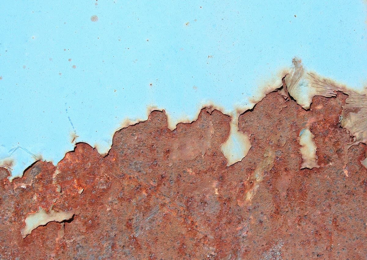 Defects in coating due to insufficient adhesion